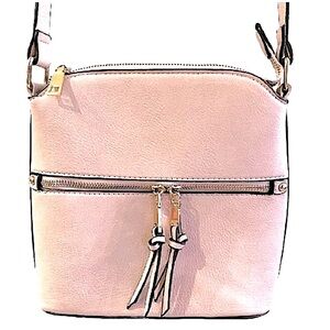 Pink blush colored faux leather crossbody bag